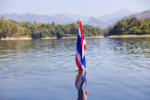 National thai flag in Songaria river and lake in Songkhla, Kanchanaburi