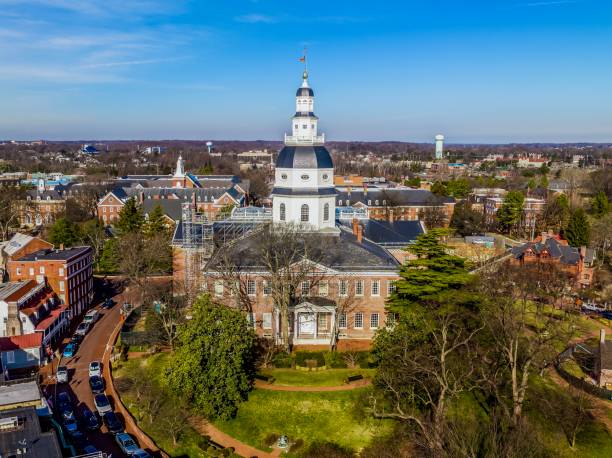 Annapolis, MD, USA - February 8, 2023: The image is of the Maryland State House, the oldest state capitol in continuous legislative use and is the only state house ever to have served as the nation's capitol. The image is taken from above ground level via drone with no identifiable people in the photo.