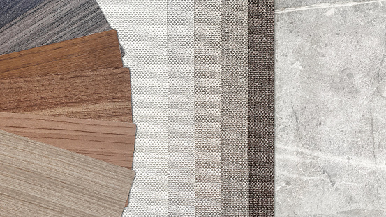 decoration materials samples, close up view, including variety of wooden laminated, brown tone of interior wallpapers, grey marble stone tile. interior mood and tone board in minimal vintage mood.