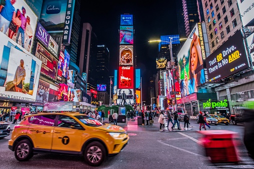 New York City, NY, USA - February 4, 2023: The image is of the city activity in Times Square, Midtown Manhattan. The image is taken from the ground level with no identifiable people in the photo.