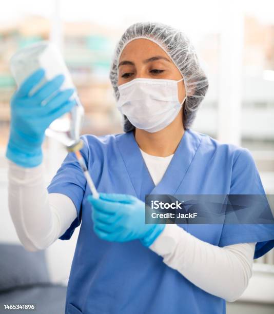 Professional Nurse Woman Making Injection In Hospital Stock Photo - Download Image Now