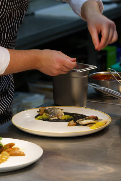 istock The cook decorates an exquisite dish. 1465343595