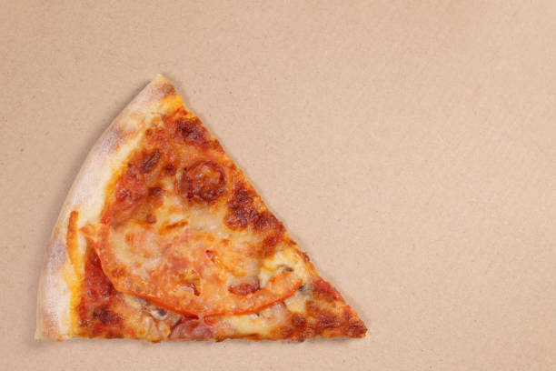 istock Slice of delicious fresh pizza in a box. copy space for text 1465345789