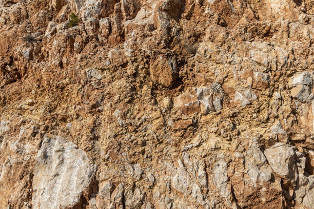 istock Beautiful texture of natural gray and orange granite stone surface we see in the photo 1465347316