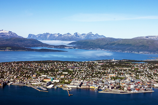 Sea view from mountain on Norwegian city Tromso beyond the Arctic circle.