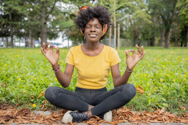 istock A young woman enjoys exercising outside 1465351695