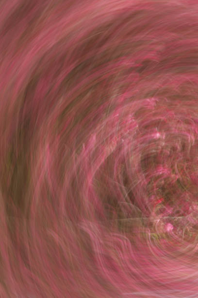 Artsy swirl motion blurred pink flowers.