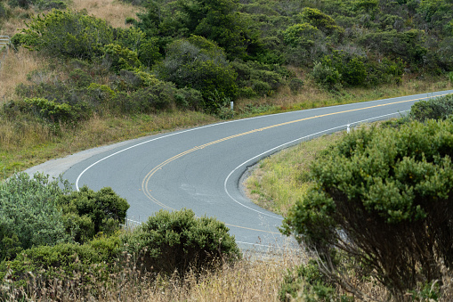 Sharp bend in coastal mountain road
