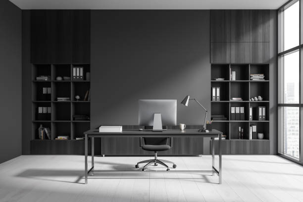 istock Grey office interior with armchair and table, cabinet and window. Mockup wall 1465357783