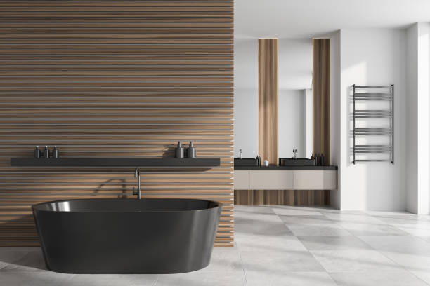 istock Stylish bathroom interior with bathtub and two sinks. Empty wall 1465358460