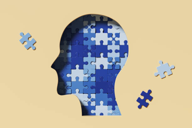 istock Blue man head profile made of puzzle elements 1465359128