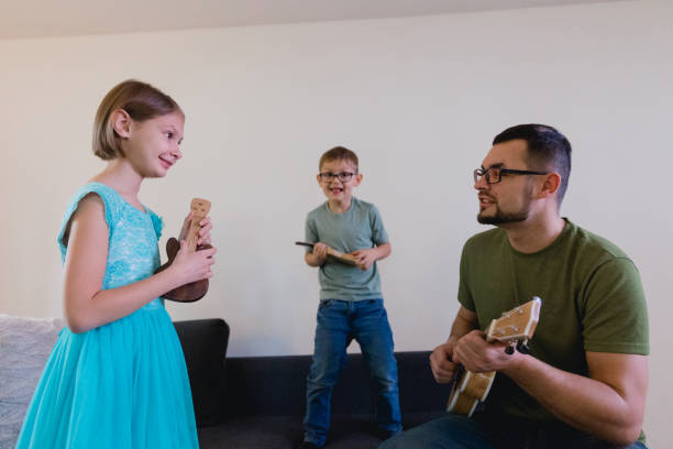istock Family Band Having Fun At Home 1465362970