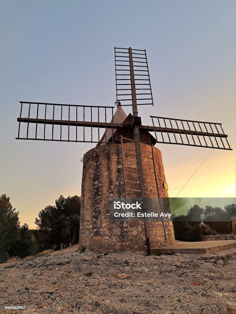 Mill in Provence A beautiful restored mill during sunset in provence Architecture Stock Photo
