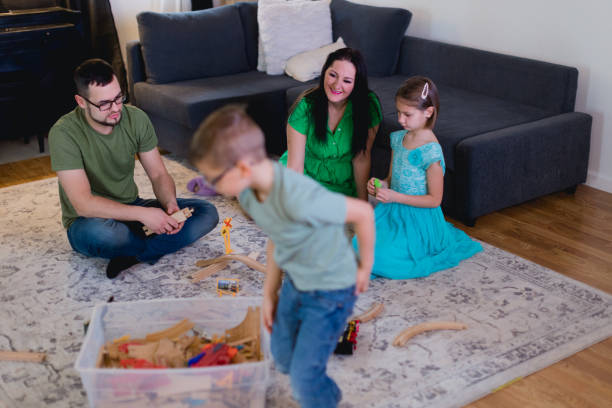 istock Happy Family Playing Together With Toys 1465362995