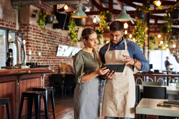 istock Waiter for help, support or business people on tablet for communication, networking or online order check. Research, planning or teamwork for inventory checklist, stock management or news blog review 1465363066