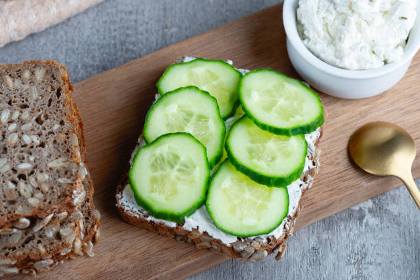 istock Healthy sandwich with white cottage cheese and cucumber 1465364572