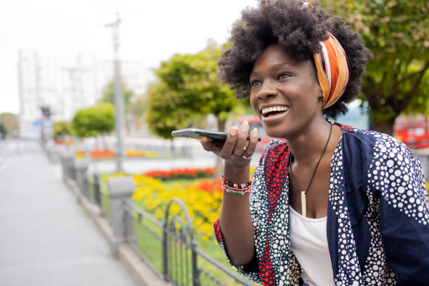 istock Happy young woman using phone 1465364660