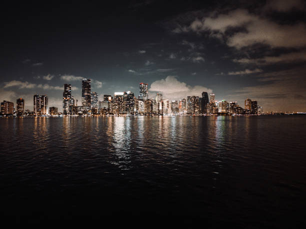 Downtown Miami Skyline at night by drone aerial stock photo