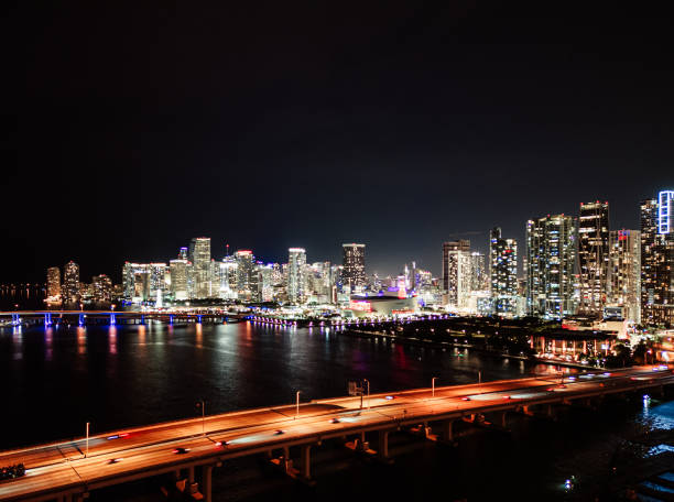 Downtown Miami Skyline at night by drone aerial stock photo