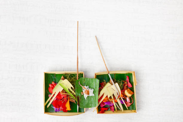 istock Traditional balinese offering on light background 1465370577