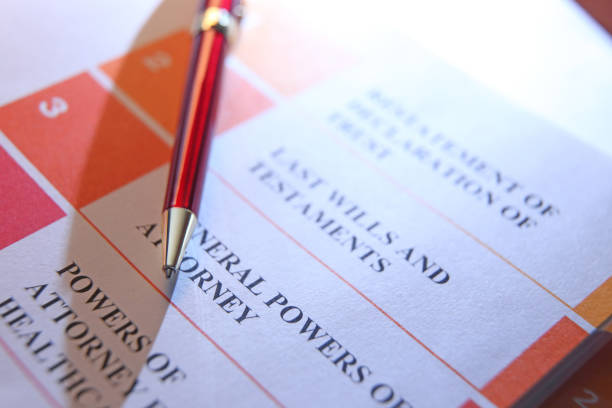 istock Ballpoint Pen Resting On Top Of Stack Of Trust Documents 1465377302