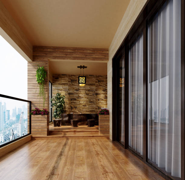 Long wide angle view of bi-level open plan home with hardwood floor and view through full length windows to backyard and swimming pool.
