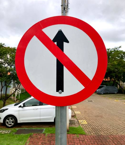istock wrong-way driving. Oncoming traffic sign 1465385040