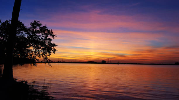 istock Colorful sunset/sunrise over water 1465407401