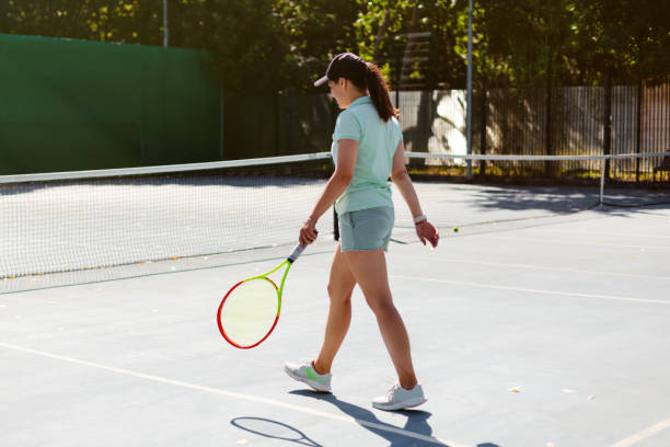 istock Woman playing tennis 1465412321