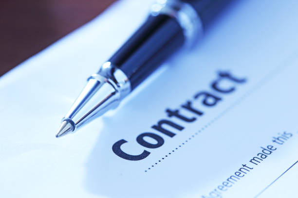 istock Ballpoint Pen Resting On Top Of Contract 1465415872