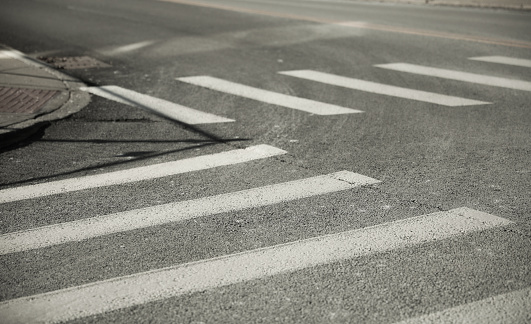 Crosswalk for pedestrian walkway in the city during daytime