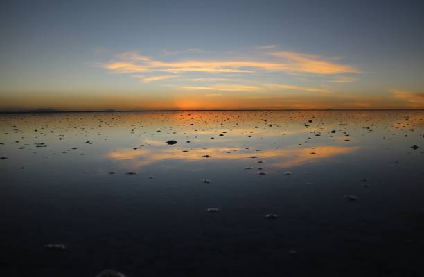 istock Sunset over Uyuni salt lake in Bolivia 1465419196