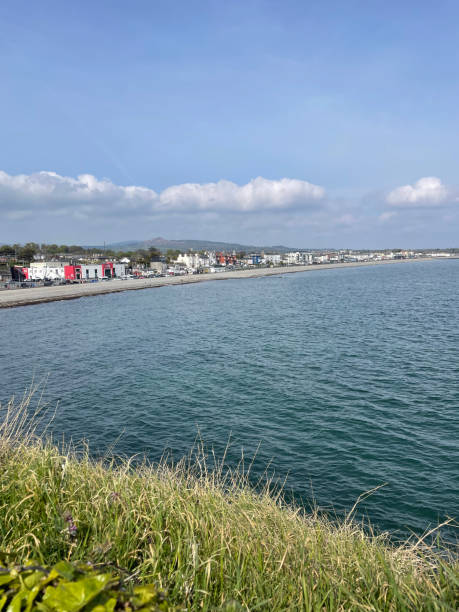 istock Distant view of a coastal town under a sunny blue sky in summer 1465424053