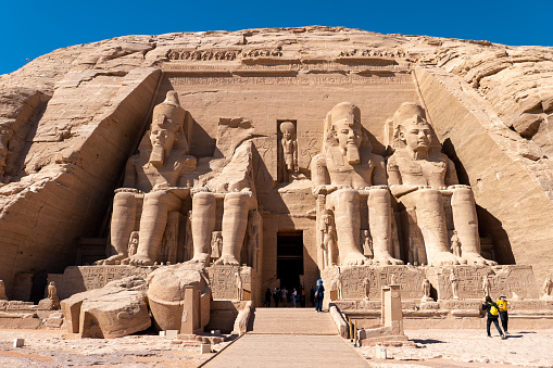 Young Caucasian woman  looking at  Abu Simbel temples