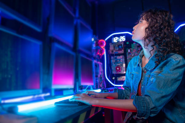 istock an asian woman programmer is working in her computer room , futuristic technology concept 1465434769