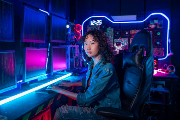 istock an asian woman programmer is working in her computer room , futuristic technology concept 1465434801