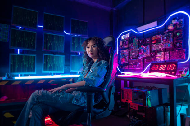 istock an asian woman programmer is working in her computer room , futuristic technology concept 1465434814