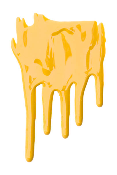 istock Yellow with pigments flowing down. Isolated on white background. 1465437056