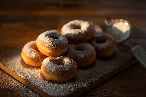 Stack of donuts with powdered sugar.Japanese donuts