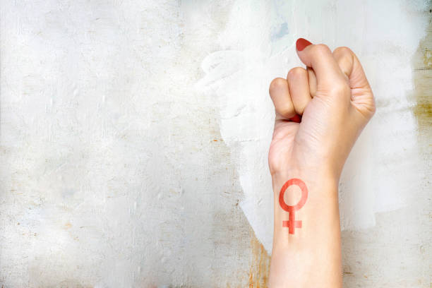Woman hand with female symbol. International Women Day
