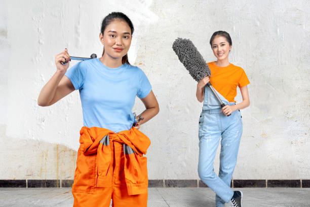 Asian woman standing with white wall background. International Women Day