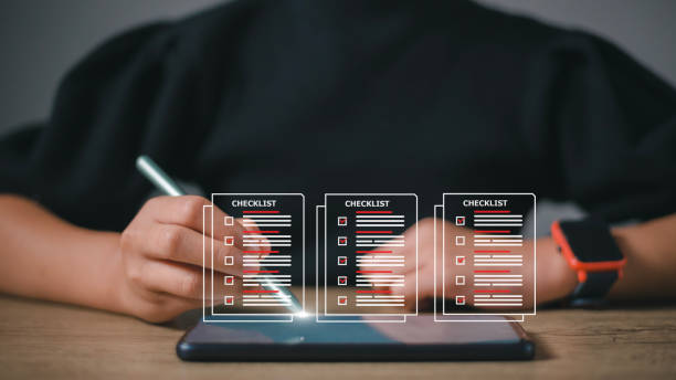 istock Checklist concept, Woman checking marks on the check boxes with marker red 1465443874