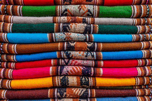 Colorful upholstery fabric samples in a furniture store.