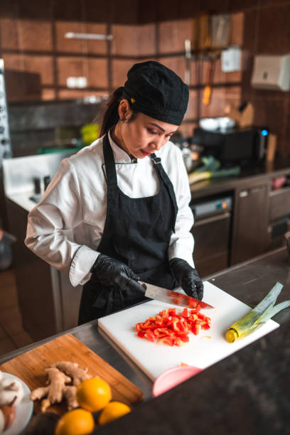 istock A Delicious Dish, Vietnamese Chef Cuts Red Peppers 1465447116