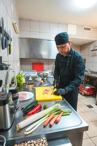 istock Flawless Preparation, Asian Cook Readies Ingredients 1465447187