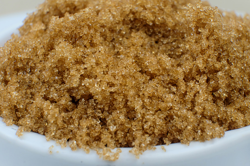 Closeup of brown sugar surface from natural cane juice