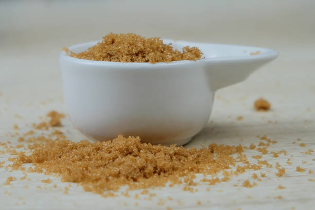 istock Brown sugar from natural cane juice on a unique white bowl 1465452289