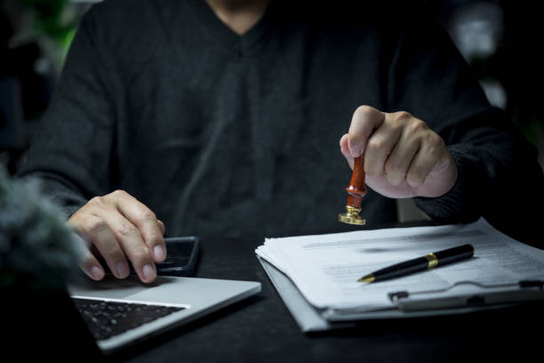 istock Contract law or paper work business and finance document rubber stamp. 1465453334