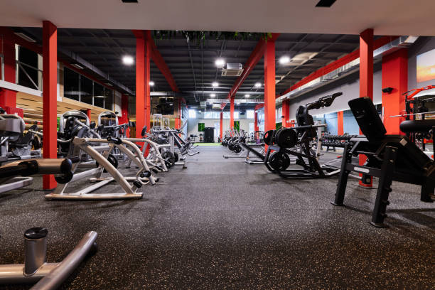 istock Gym without people with large group of exercise machines. 1465454750