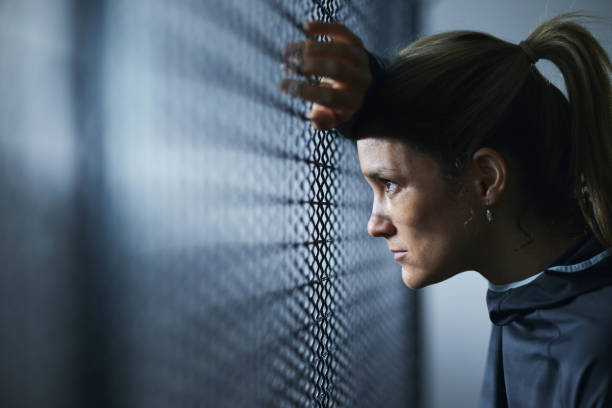 istock Pensive female athlete leaning on bars. 1465455424